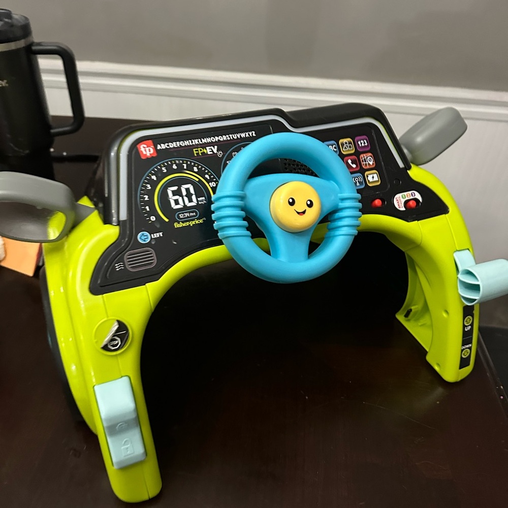 SOLD Fisher-Price Sit & Steer Driver Toy